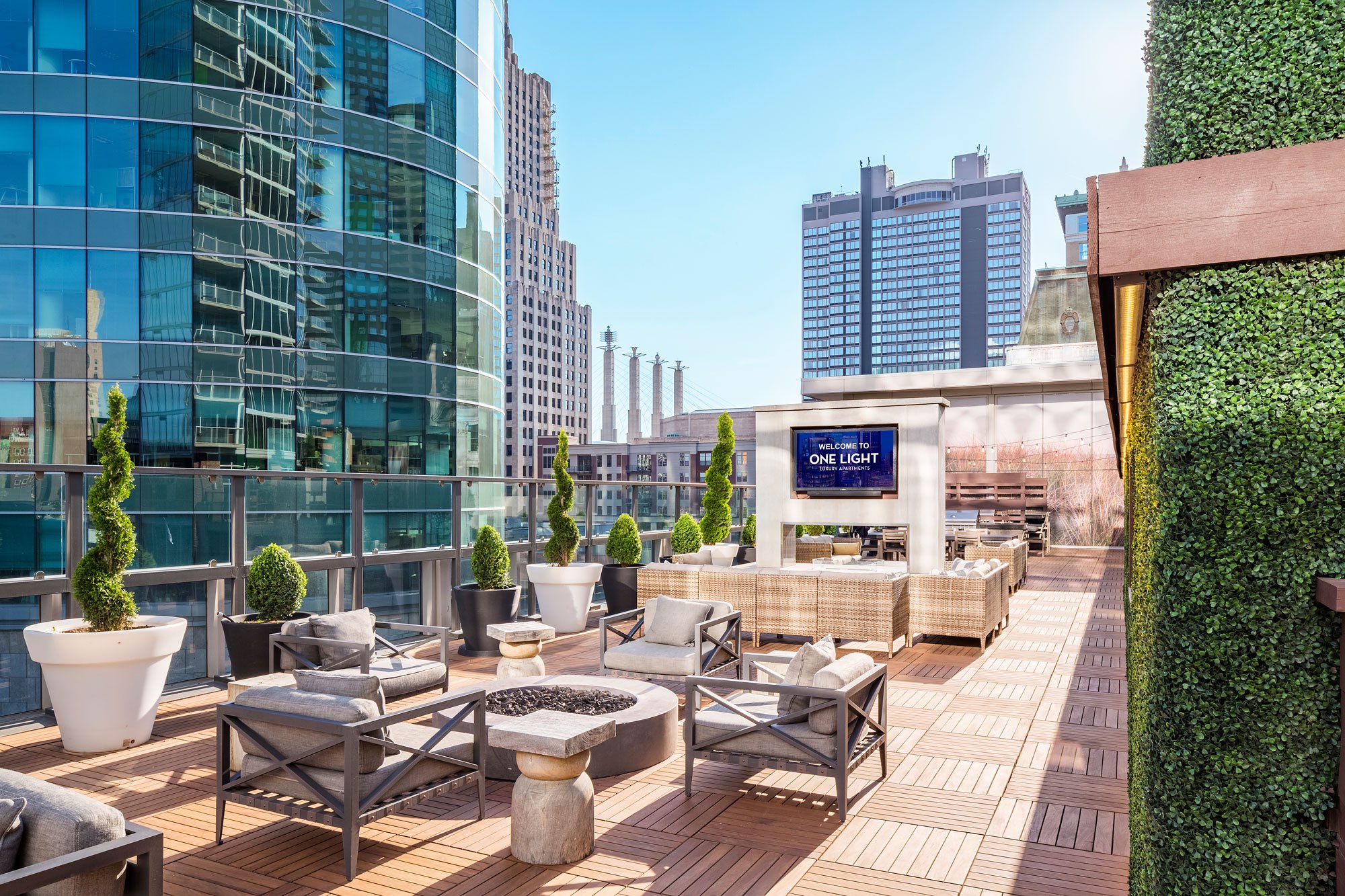 Rooftop lounge, fire pits, and grill amenities at One Light Luxury Apartment Community in the Power & Light District of Kansas City, MO