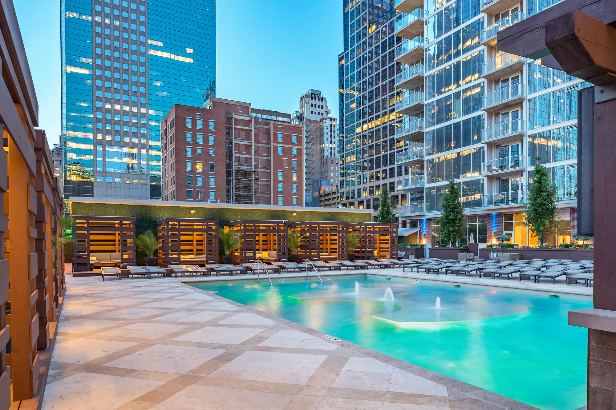 Pool Deck with Private Cabanas at One Light Luxury Apartments