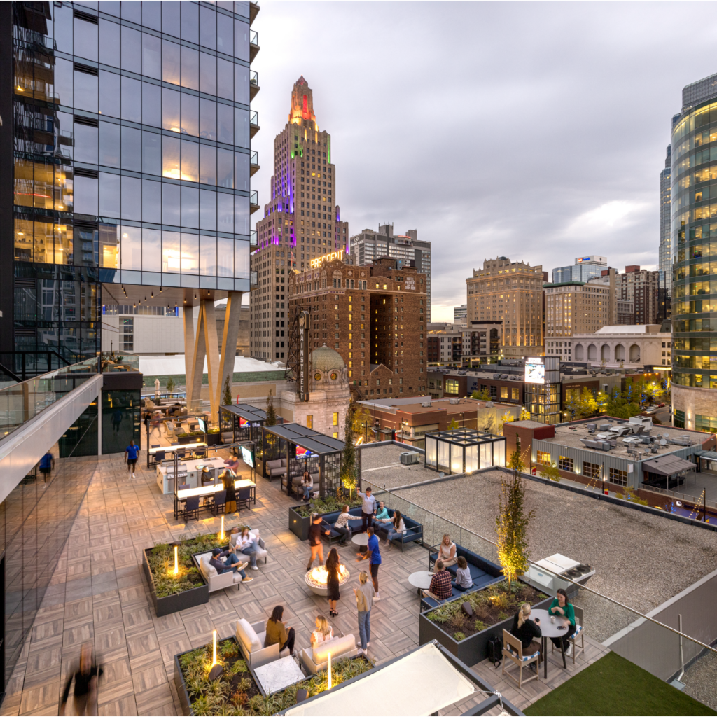 The outdoor terrace amenity space at Three Light Luxury Apartments.