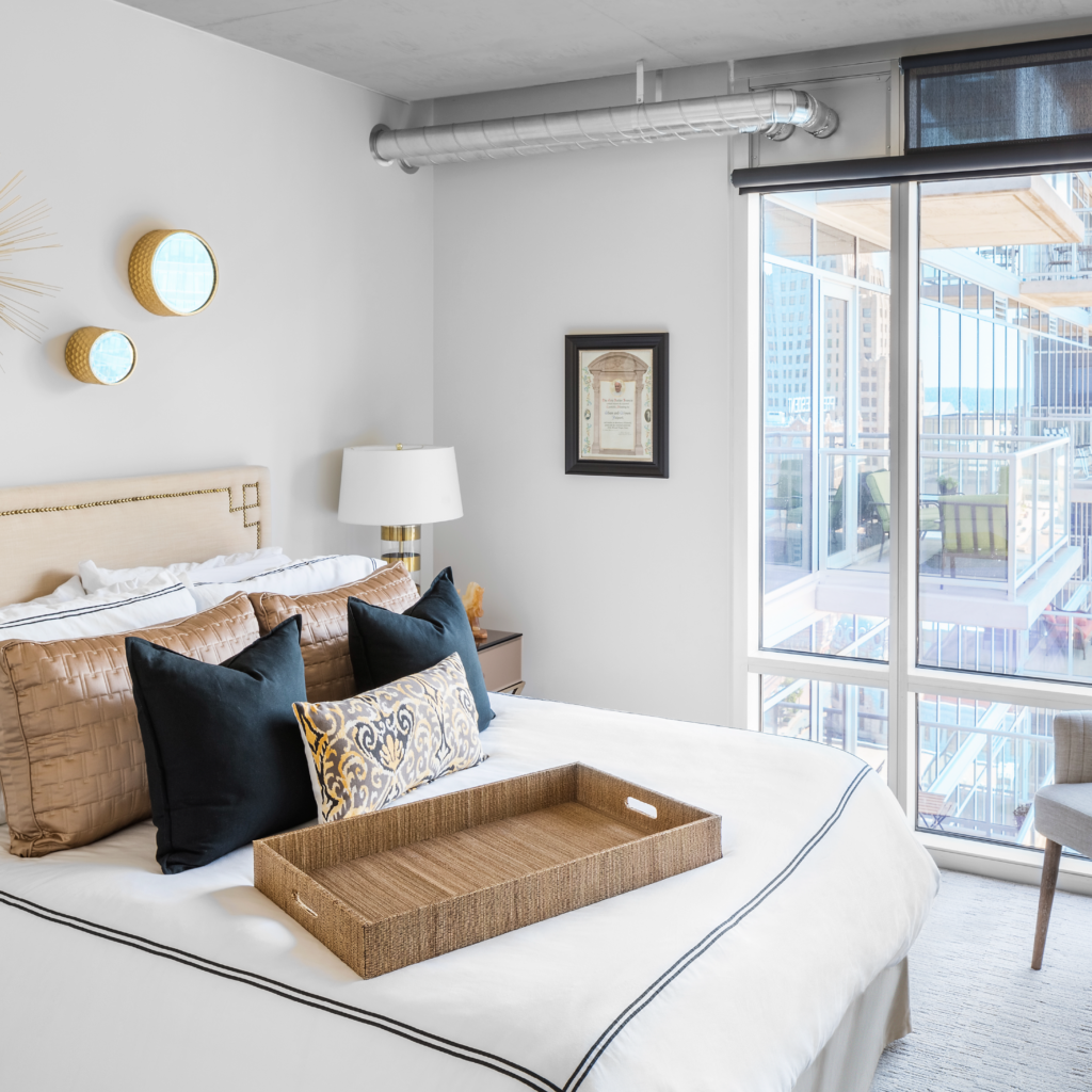 A bedroom at Two Light Luxury Apartments.