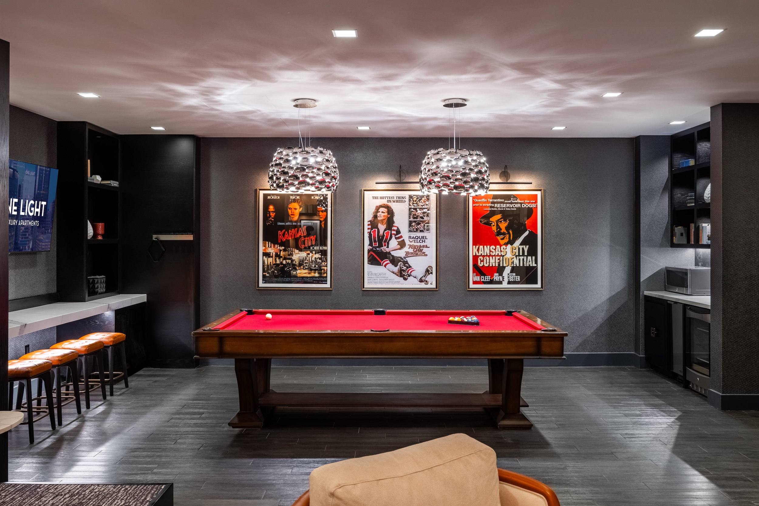 Pool Table and Vintage Posters in One Light Entertainment Room
